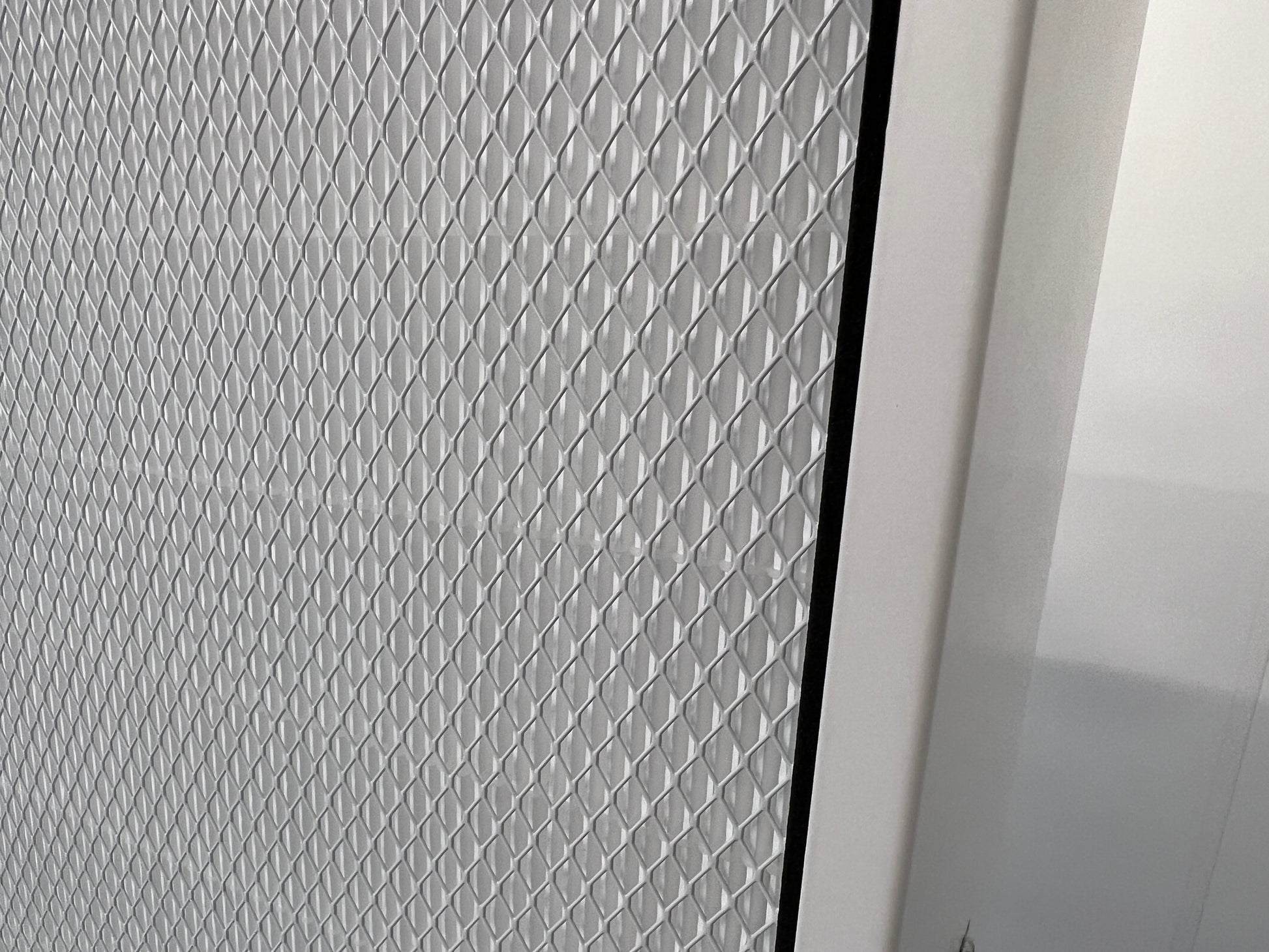 A zoomed-in image of the HEPA filter and grille
