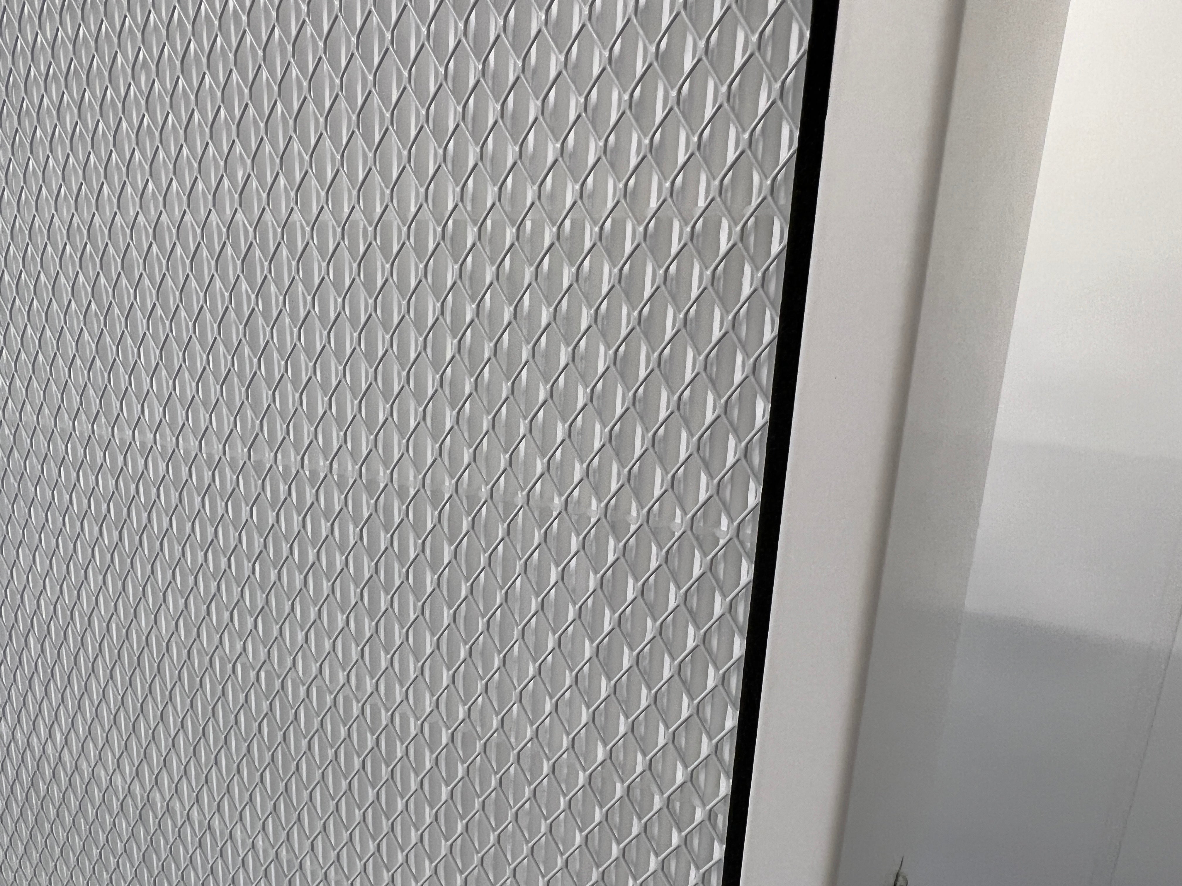 A zoomed-in image of the HEPA filter and grille
